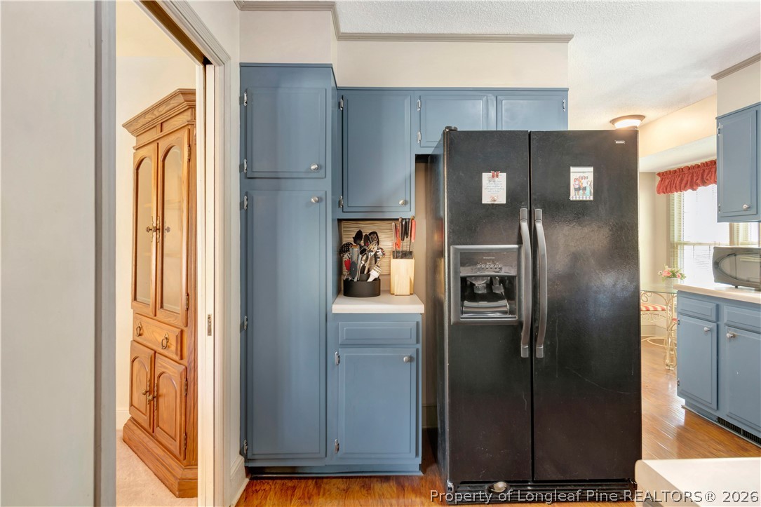 5219 McLeod Road Lumberton, NC 28358 - Photo 8 of 33 a metallic refrigerator freezer sitting in a kitchen