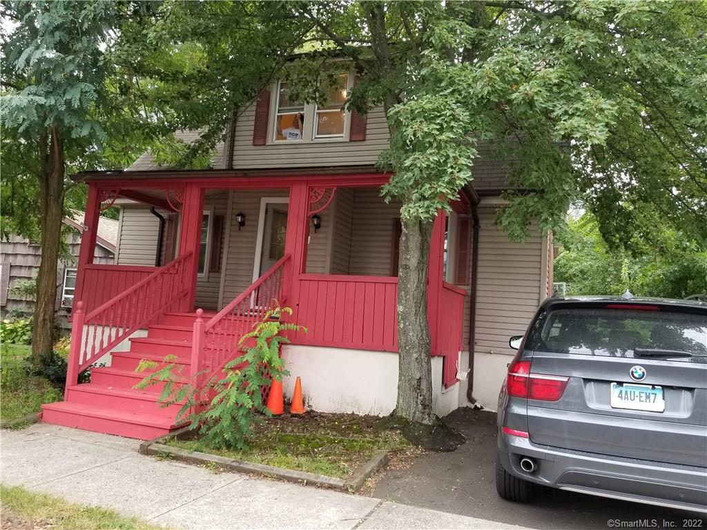 104 Ruden Street West Haven, CT 06516 - Photo 1 of 1 a front view of a house with a yard