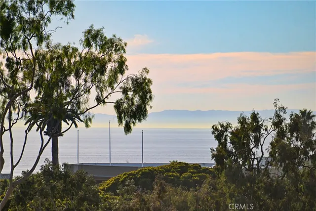 a view of a balcony with furniture