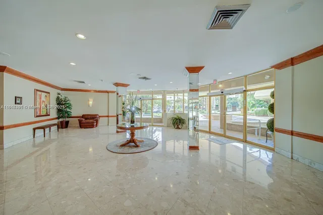 a view of a living room and bedroom