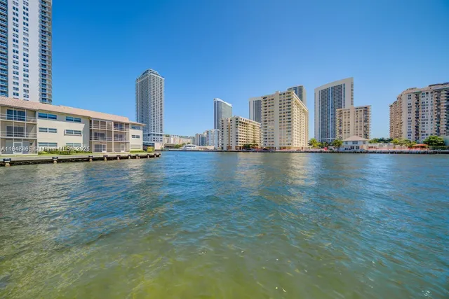 a view of city with tall buildings