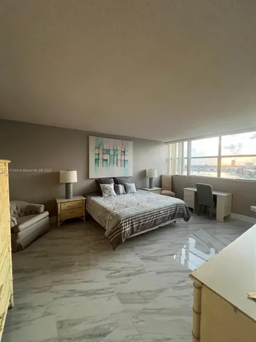 a view of livingroom with hardwood floor and window