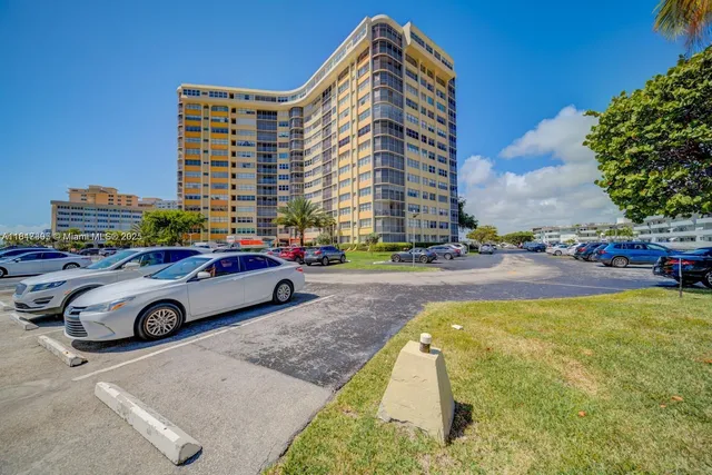 a cars parked in front of a building