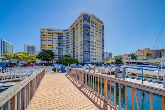 a view of balcony with outdoor seating and city view