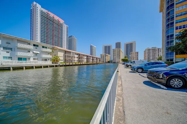a view of a lake in front of a building