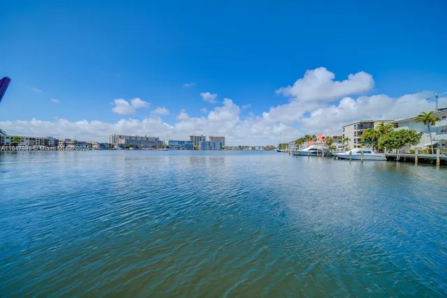 a view of a lake with beach