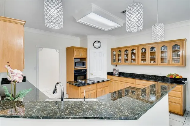 a view of a living room and kitchen