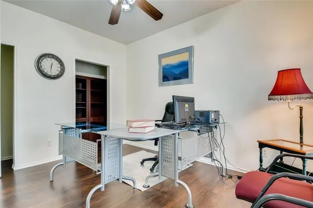 a view of a workspace with furniture