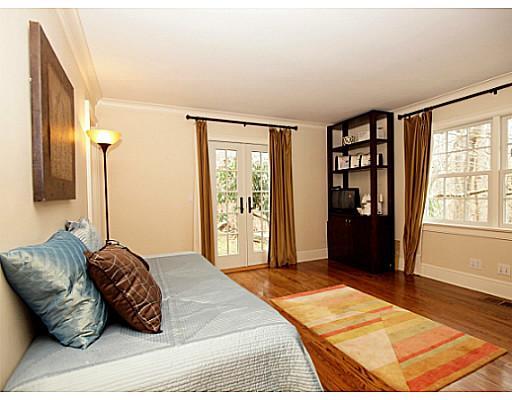 49 Pecksland Road Greenwich, CT 06831 - Photo 12 of 18 a bedroom with a bed and a window