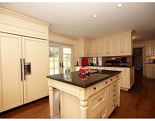 49 Pecksland Road Greenwich, CT 06831 - Photo 5 of 18 a kitchen with stainless steel appliances granite countertop a stove a refrigerator and a refrigerator