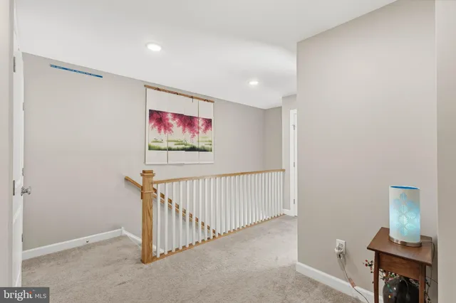 a view of a hallway with workspace