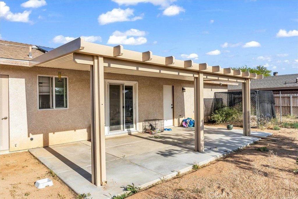 13146 Mohawk Road Apple Valley, CA 92308 - Photo 15 of 15 a view of a building with street view