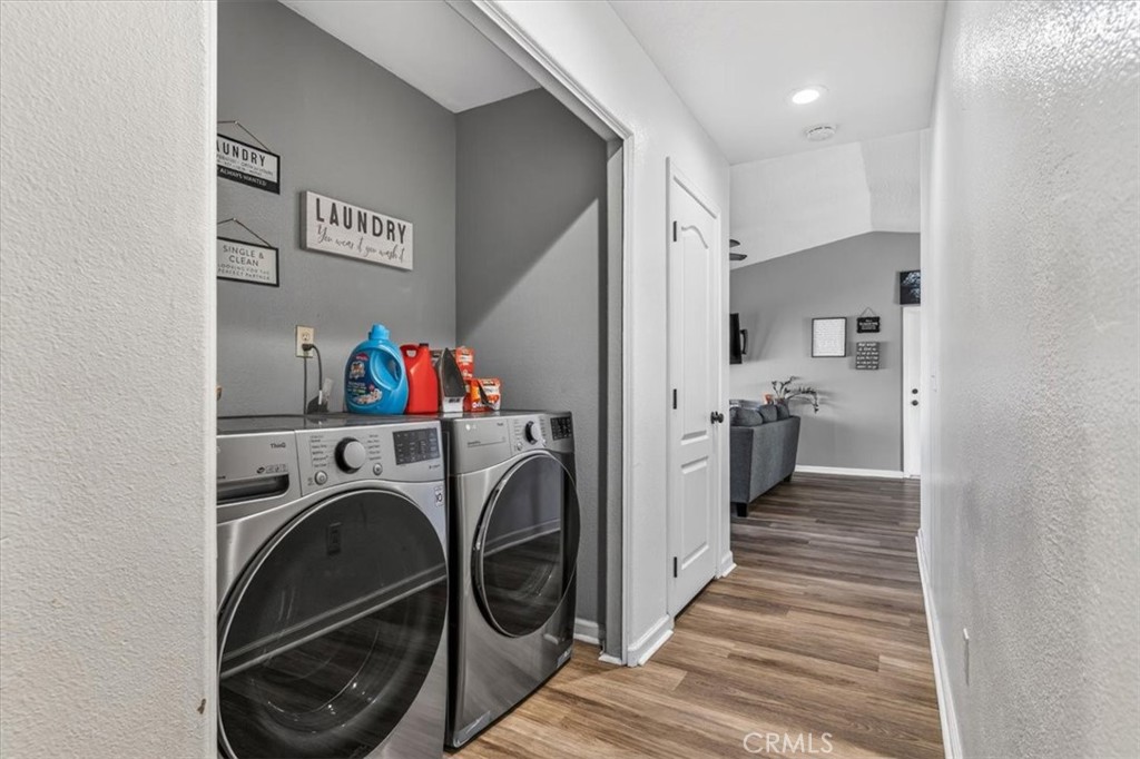 13146 Mohawk Road Apple Valley, CA 92308 - Photo 9 of 15 a view of a storage & utility room with washer and dryer