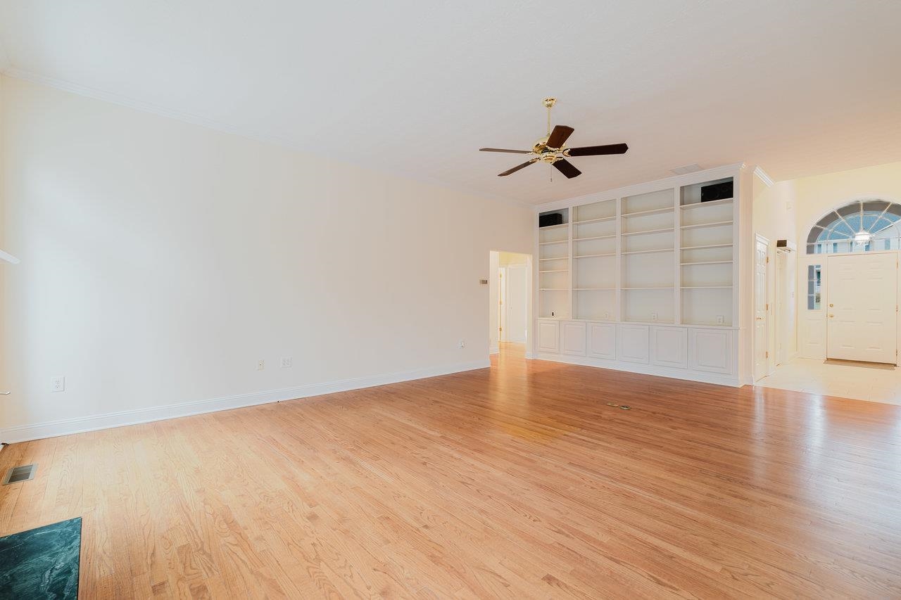 3881 Davis Road Penn Laird, VA 22846 - Photo 11 of 75 wooden floor in an empty room with a window