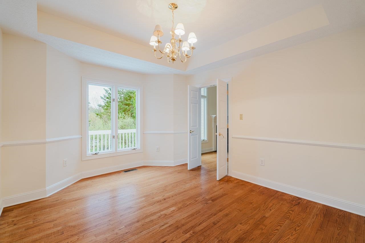 3881 Davis Road Penn Laird, VA 22846 - Photo 27 of 75 wooden floor in an empty room with a window