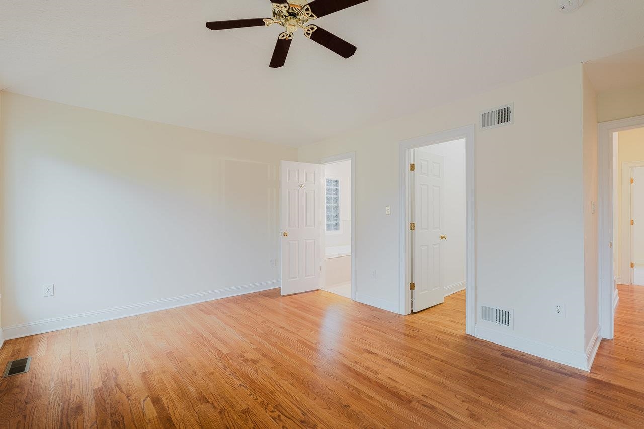 3881 Davis Road Penn Laird, VA 22846 - Photo 33 of 75 a view of a room with wooden floor and bathroom