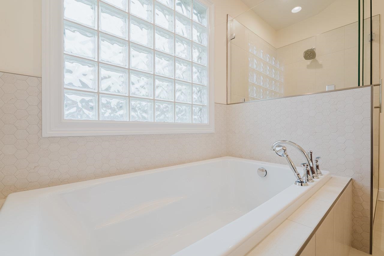 3881 Davis Road Penn Laird, VA 22846 - Photo 38 of 75 a white bath tub sitting next to a window