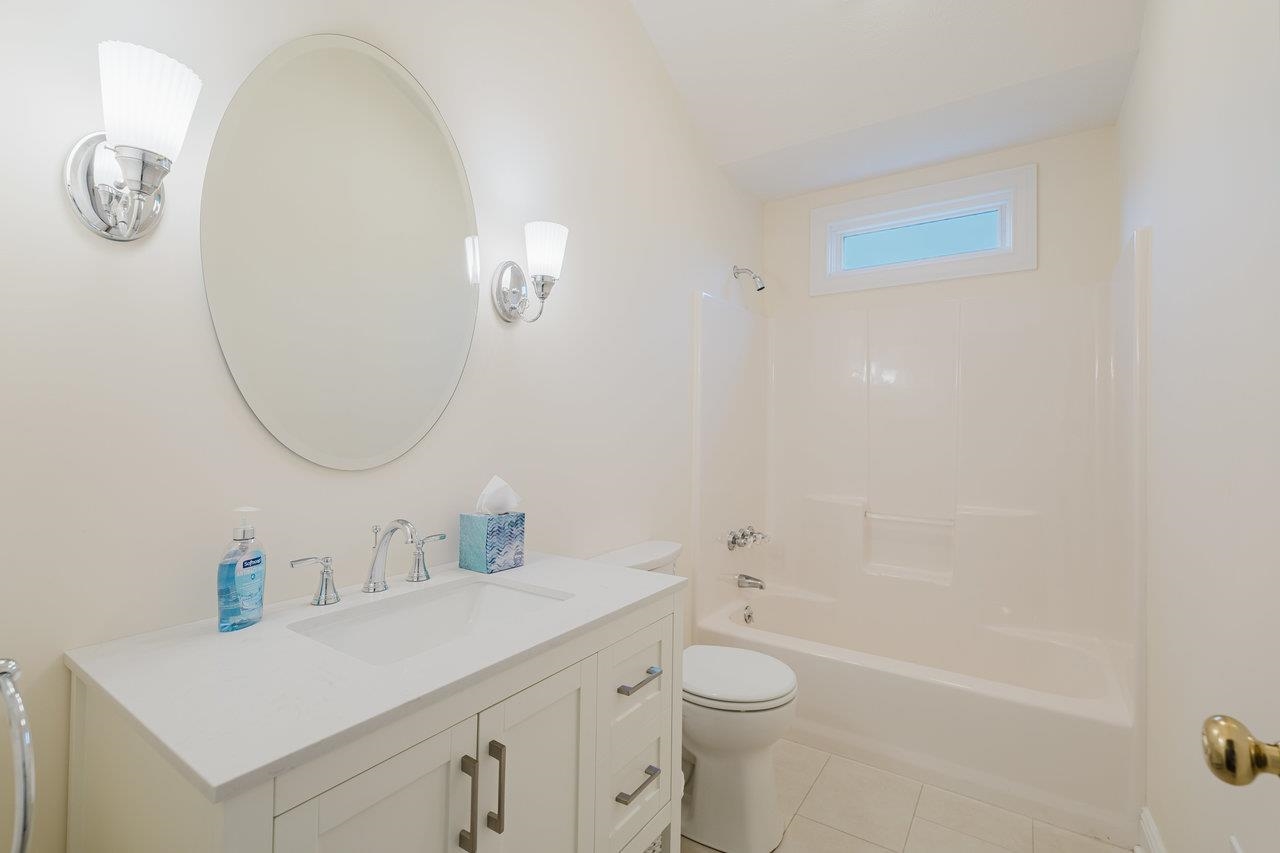 3881 Davis Road Penn Laird, VA 22846 - Photo 46 of 75 a bathroom with a sink a toilet and a mirror