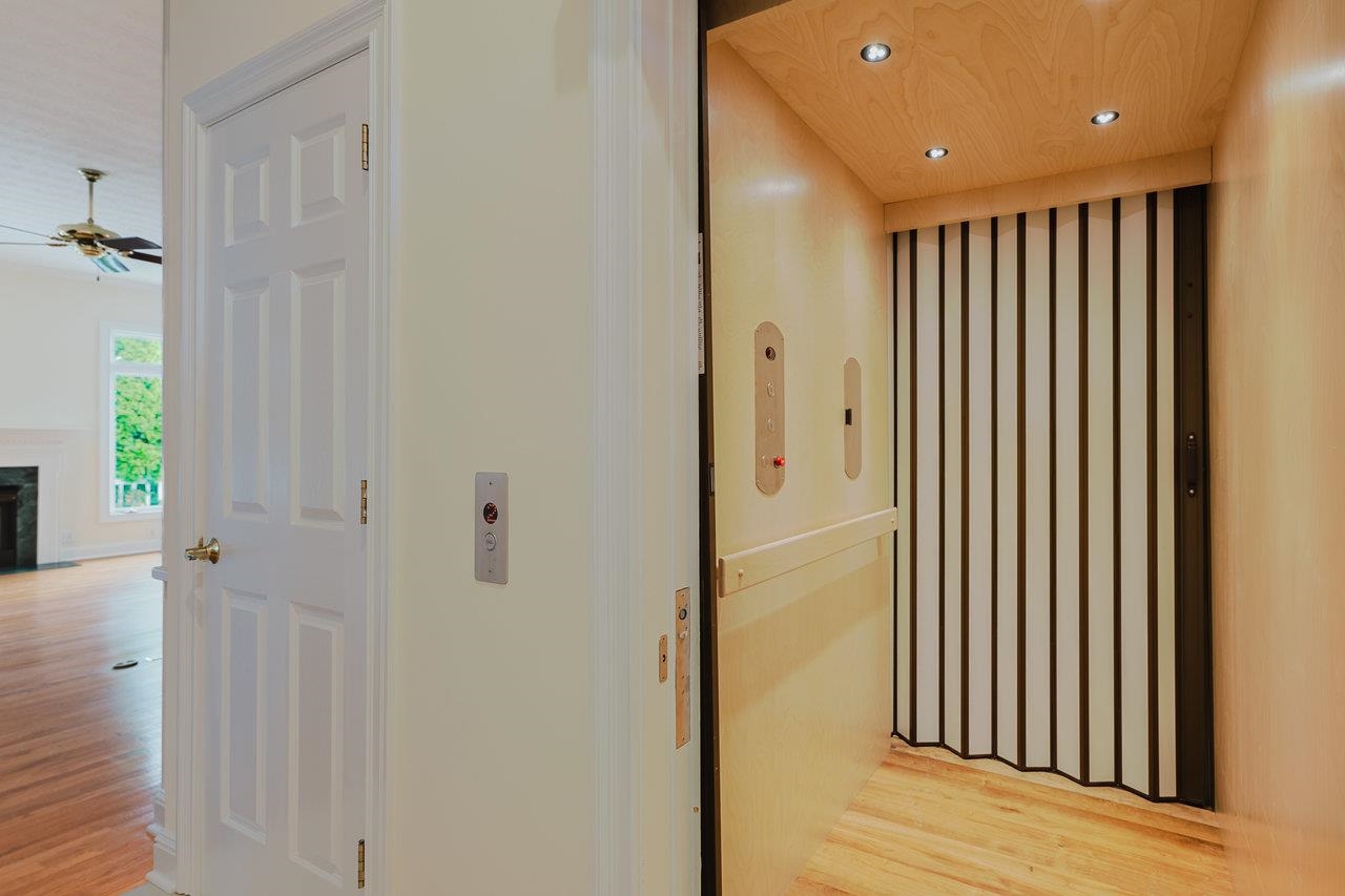 3881 Davis Road Penn Laird, VA 22846 - Photo 6 of 75 a view of a hallway with wooden floor and staircase