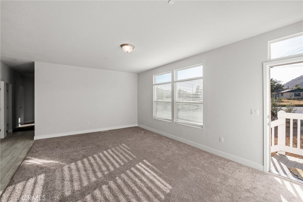 26220 Calvert Avenue Hemet, CA 92545 - Photo 24 of 69 a view of an empty room with a window