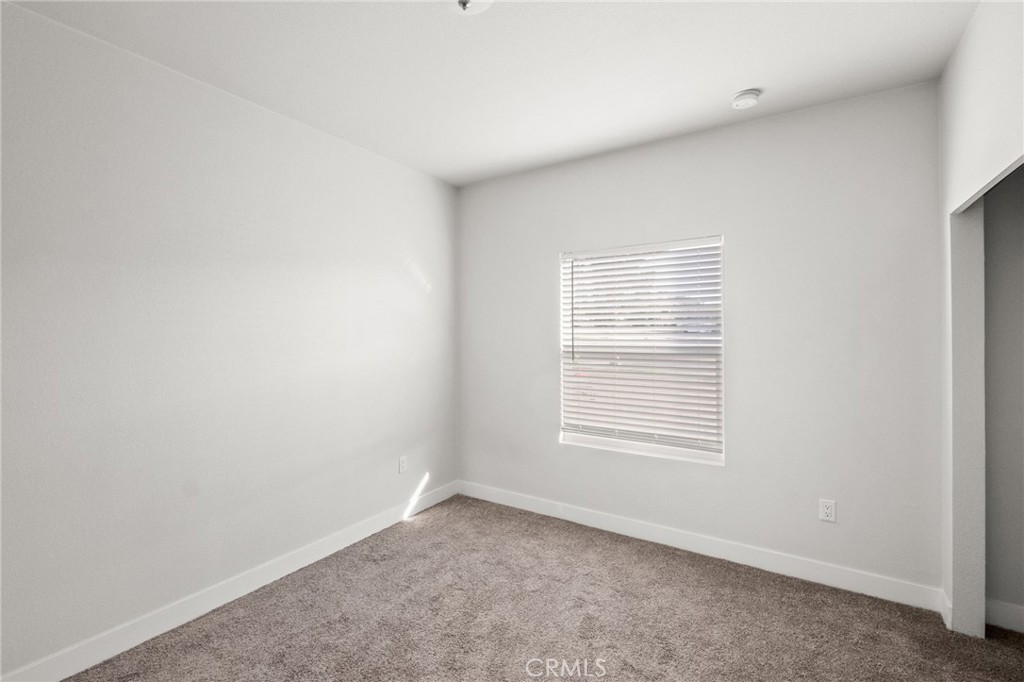 26220 Calvert Avenue Hemet, CA 92545 - Photo 41 of 69 an empty room with a window