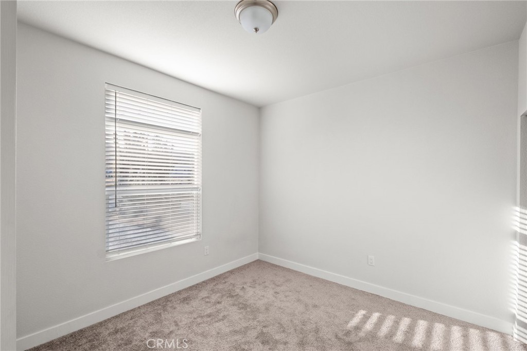 26220 Calvert Avenue Hemet, CA 92545 - Photo 43 of 69 an empty room with windows