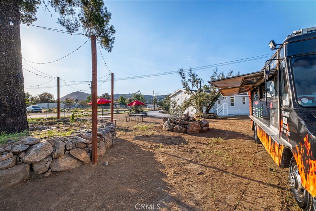 26220 Calvert Avenue Hemet, CA 92545 - Photo 51 of 69 a view of a terrace with chairs