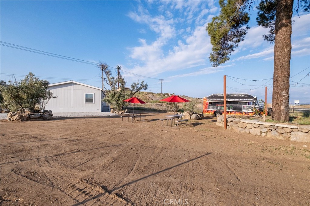 26220 Calvert Avenue Hemet, CA 92545 - Photo 59 of 69 a view of car parked in front of house