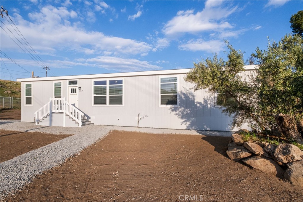 26220 Calvert Avenue Hemet, CA 92545 - Photo 64 of 69 a view of a house with a patio