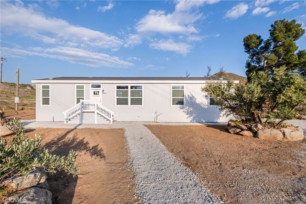 26220 Calvert Avenue Hemet, CA 92545 - Photo 65 of 69 a view of a house with backyard and sitting area