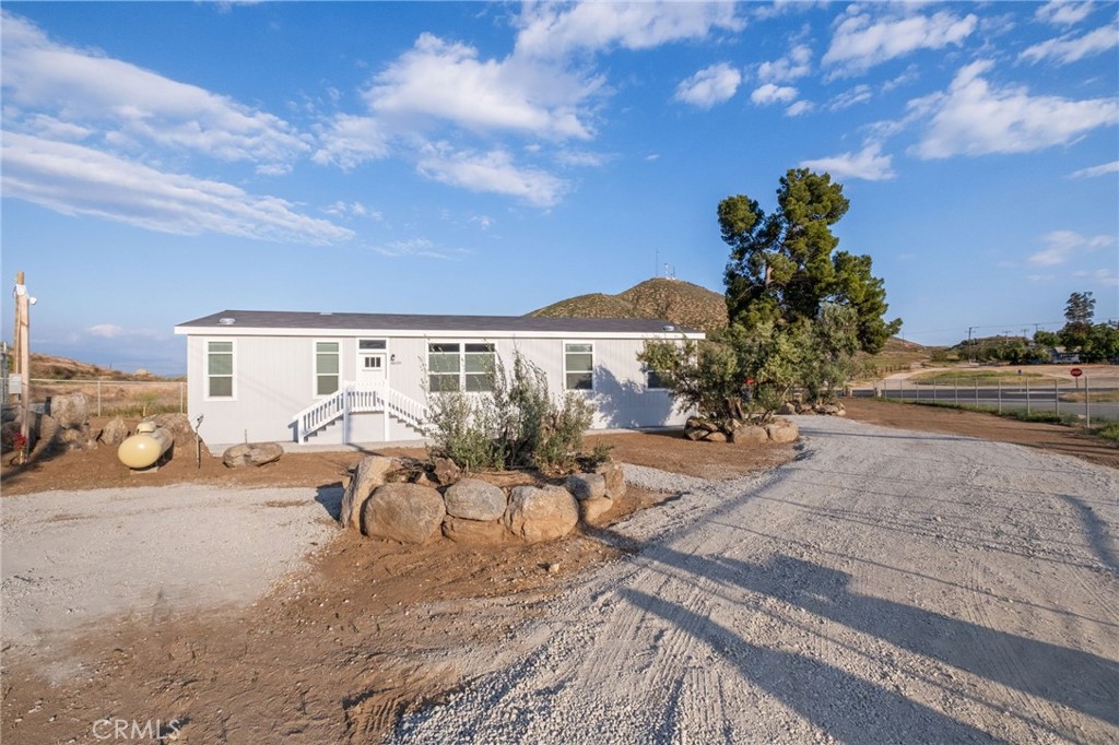 26220 Calvert Avenue Hemet, CA 92545 - Photo 66 of 69 a view of a backyard with a patio