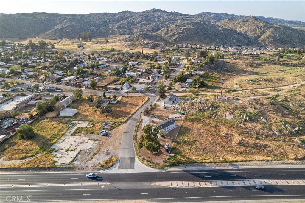 26220 Calvert Avenue Hemet, CA 92545 - Photo 8 of 69 an aerial view of residential houses and outdoor space