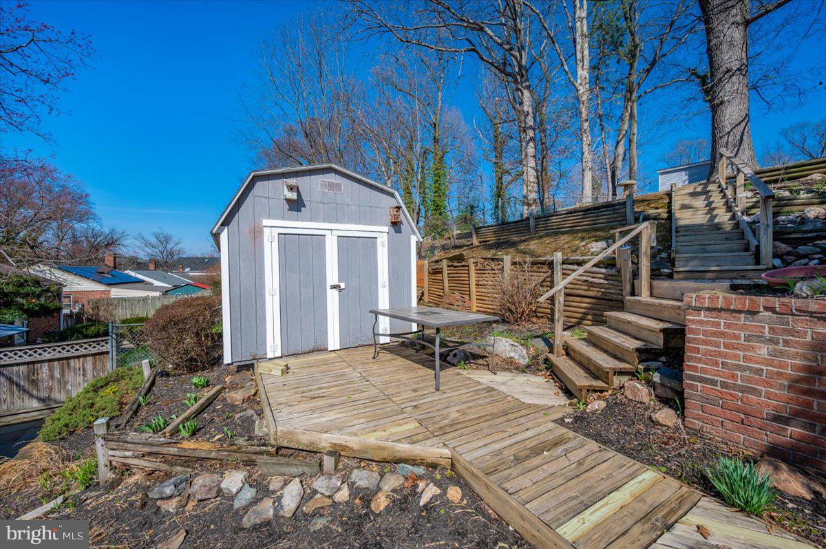 11852 Huggins Drive Silver Spring, MD 20902 - Photo 46 of 63 Charming shed nestled in a serene yard.