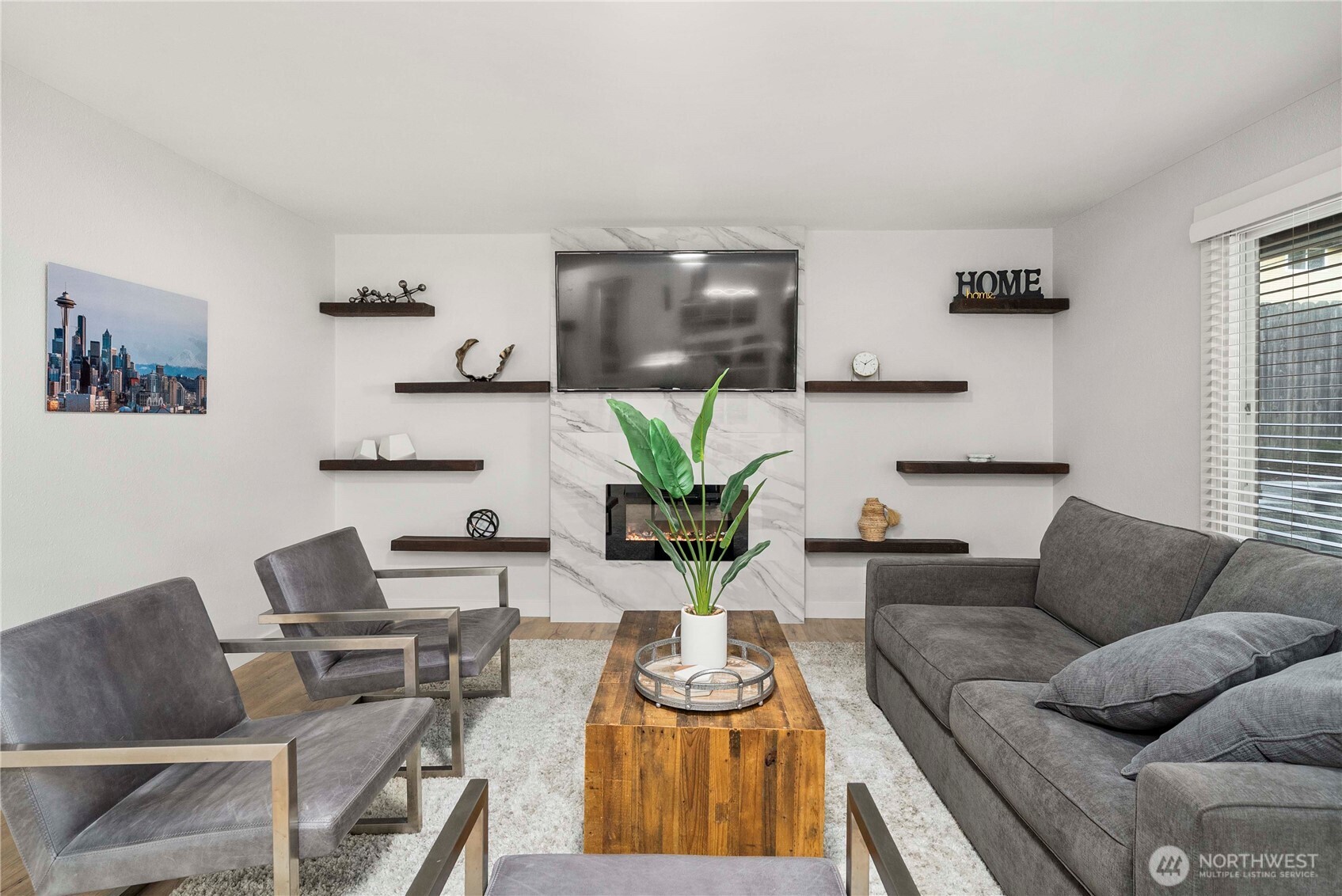 622 South 150th Street Burien, WA 98148 - Photo 13 of 25 a living room with furniture and a potted plant