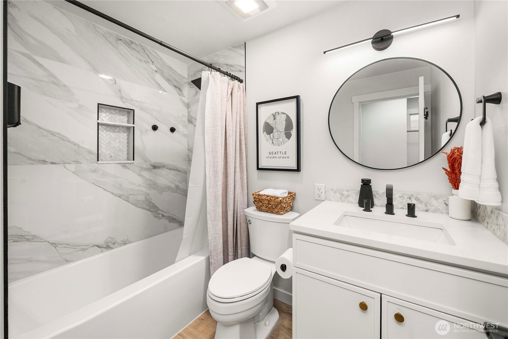 622 South 150th Street Burien, WA 98148 - Photo 14 of 25 a bathroom with a sink toilet and shower