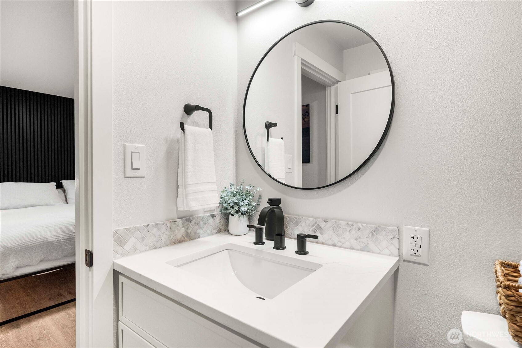 622 South 150th Street Burien, WA 98148 - Photo 18 of 25 a bathroom with a sink and a mirror