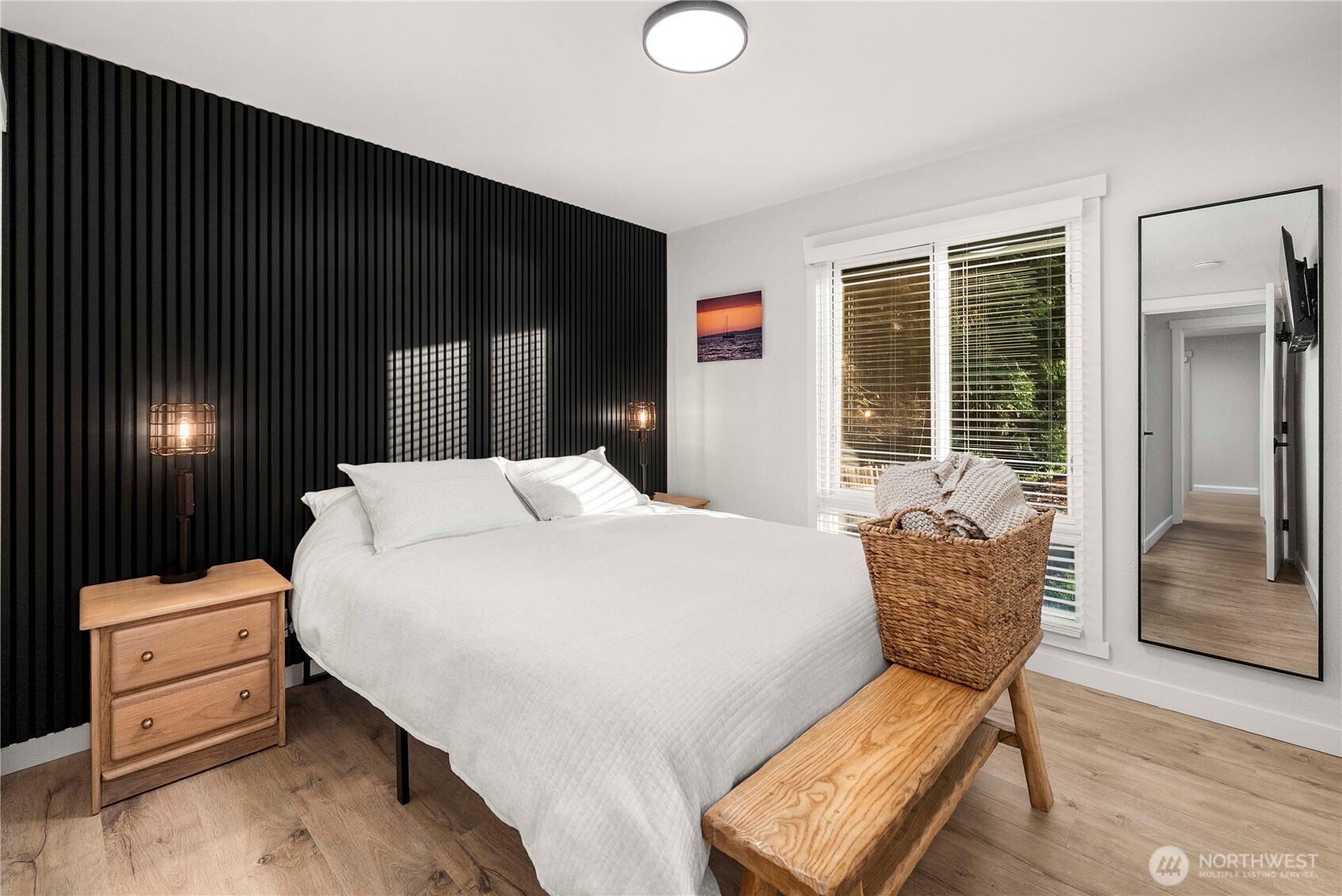 622 South 150th Street Burien, WA 98148 - Photo 20 of 25 a bedroom with a bed and wooden floor