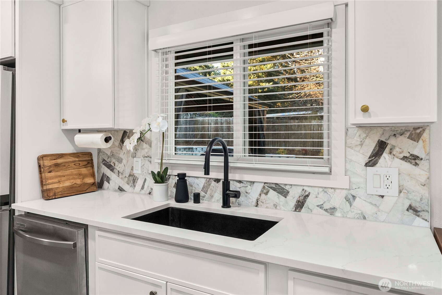 622 South 150th Street Burien, WA 98148 - Photo 10 of 25 a bathroom with a sink and a window