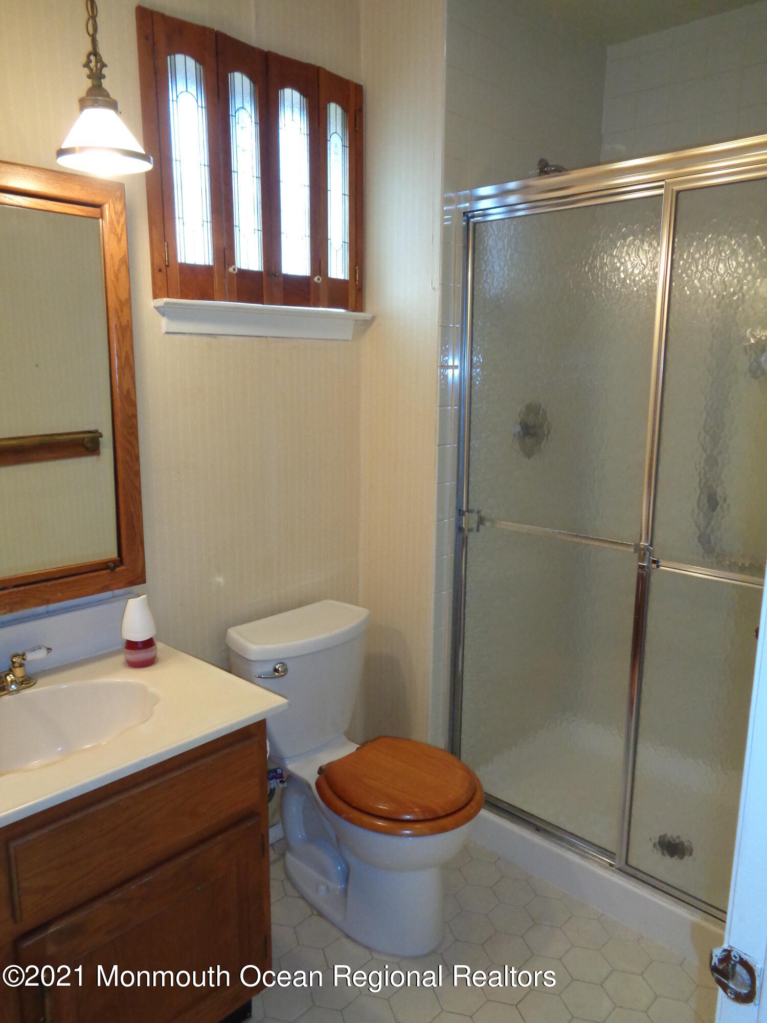 5 Amesbury Road Whiting, NJ 08759 - Photo 13 of 19 a bathroom with a sink a toilet and shower