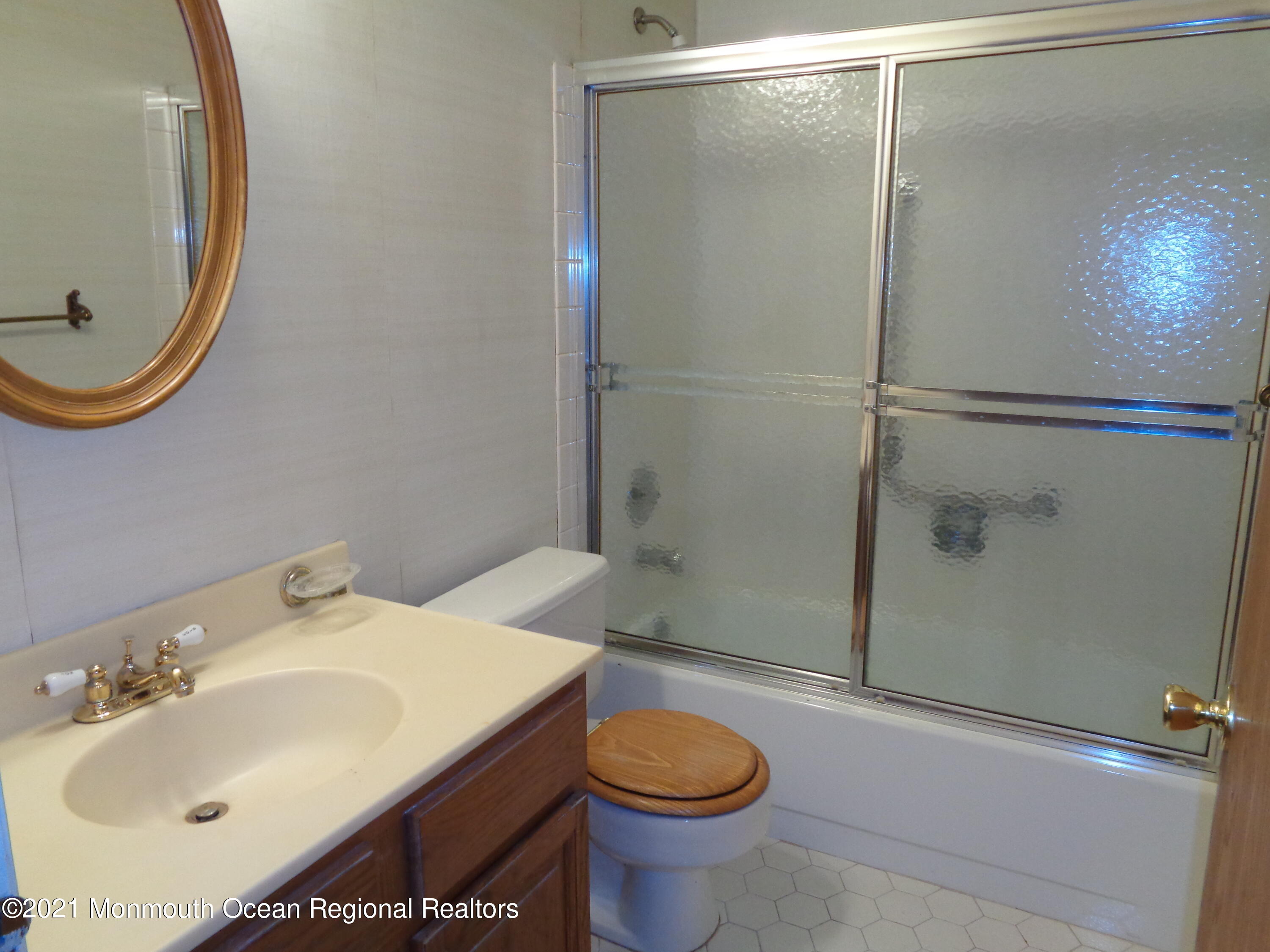 5 Amesbury Road Whiting, NJ 08759 - Photo 14 of 19 a bathroom with a sink toilet and shower