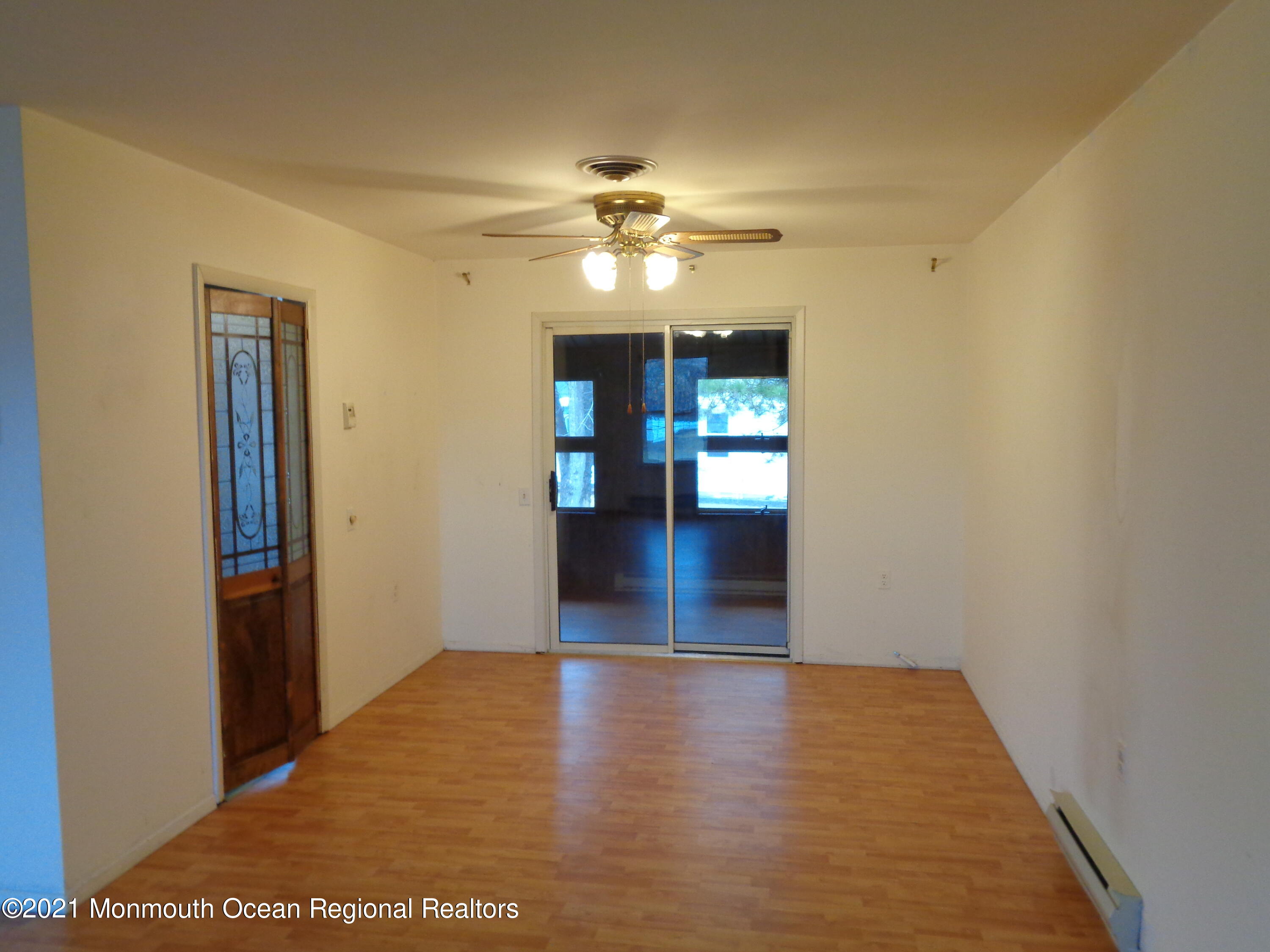5 Amesbury Road Whiting, NJ 08759 - Photo 3 of 19 a view of empty room with wooden floor