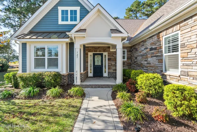 $680,000 | 127 Clubhouse Road, Sunset Beach, NC 28468