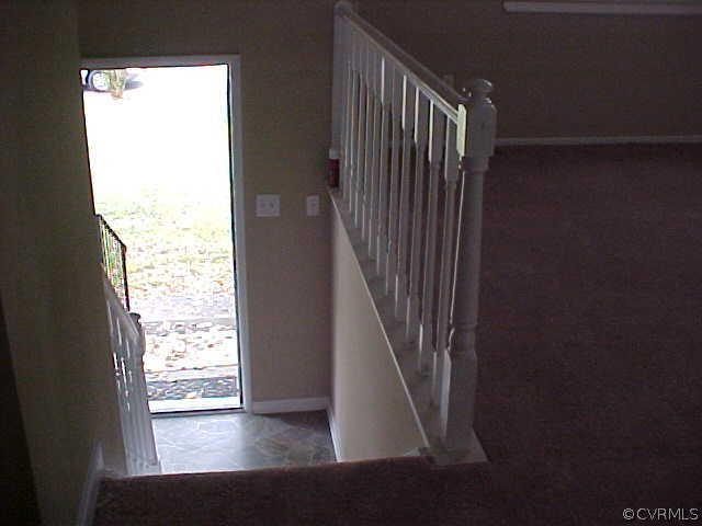 9305 Cason Road Glen Allen, VA 23060 - Photo 3 of 12 a view of entryway with wooden floor and door