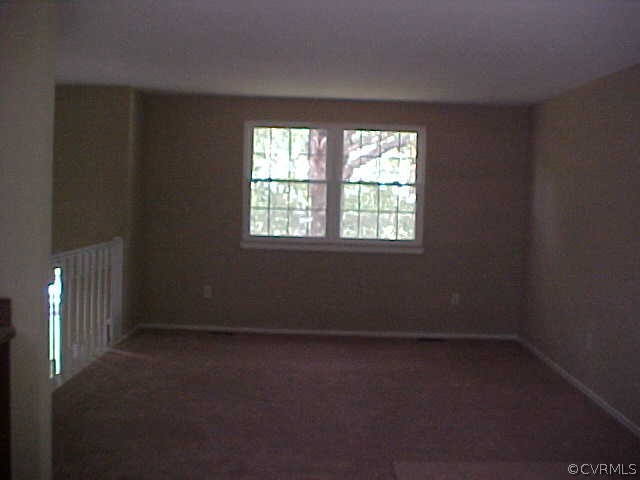 9305 Cason Road Glen Allen, VA 23060 - Photo 5 of 12 an empty room with a window