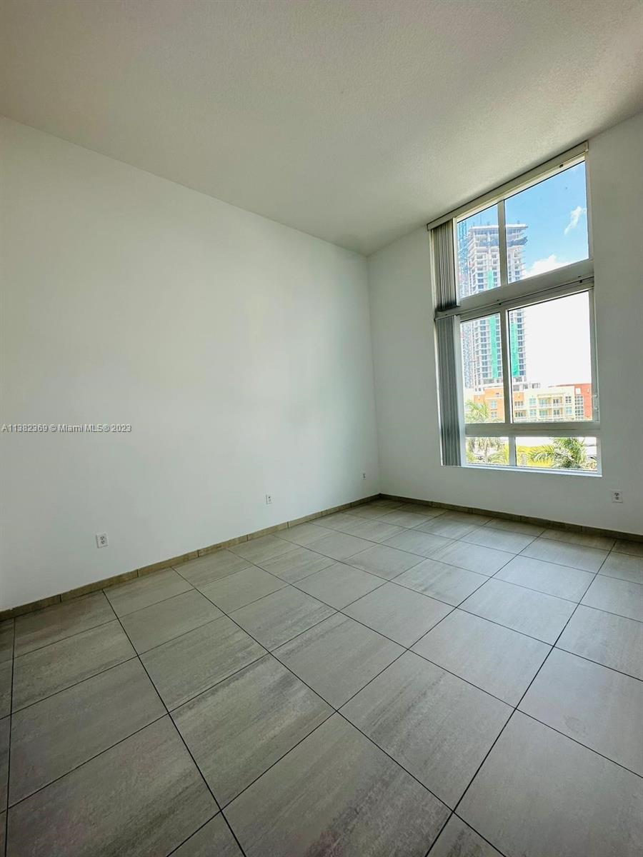 Edgewater Miami, FL 33132 - Photo 15 of 25 an empty room with windows