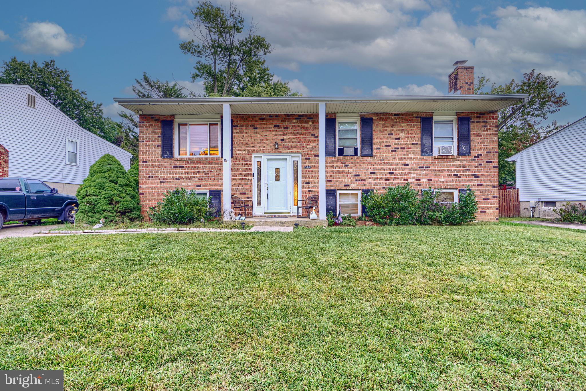 3907 Roxanne Road Randallstown, MD 21133 - Photo 1 of 9 front view of a house with a yard