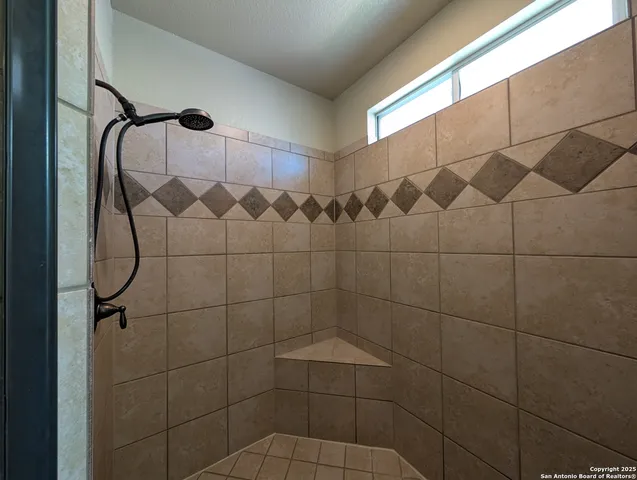 a bathroom with a sink and a bathtub