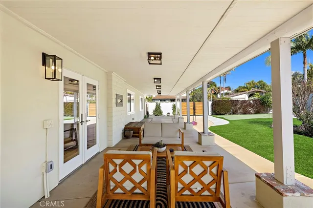 a view of a dining room with furniture window and garden