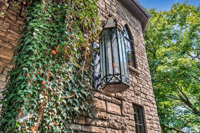 a bathroom with a tub and shower