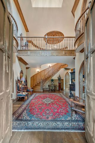 a view of livingroom with furniture and workspace